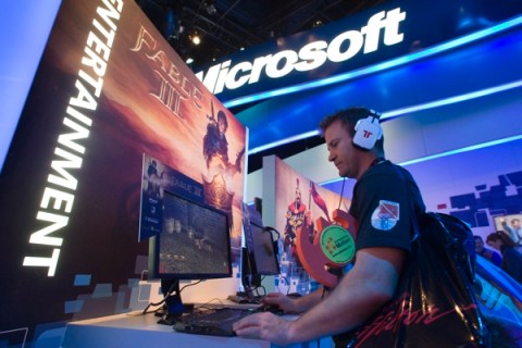Man plays a Fable III PC game at the Microsoft booth during the 2011 International Consumer Electronics Show (CES) in Las Vegas