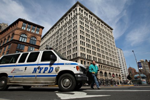A New York Police Department van passes near 770 Broadway, t