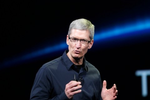 Apple CEO Cook speaks on stage during an Apple event introducing the new iPad in San Francisco