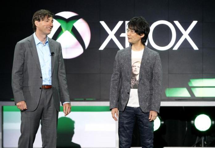 Mattrick stands next to Kojima, creator of "Metal Gear Solid," as they announce the next chapter of the franchise "Metal Gear Solid 5: The Phantom Pain" during the Xbox E3 Media Briefing in Los Angeles