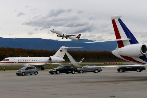 The aircraft of Germany's Foreign Minister Westerwelle arrives next to French Foreign Minister Fabius aircraft in Geneva