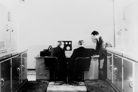 Alan M Turing and colleagues working on the Ferranti Mark I Computer, 1951.