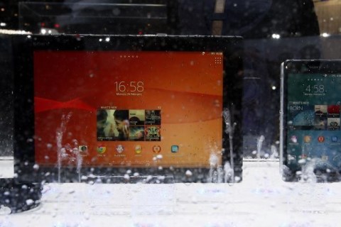 A Sony Xperia Z2 smartphone and a Sony Xperia Z2 tablet are displayed at the company's stand during the Mobile World Congress in Barcelona